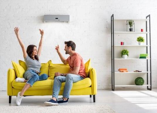 happy homeowners with a ductless ac
