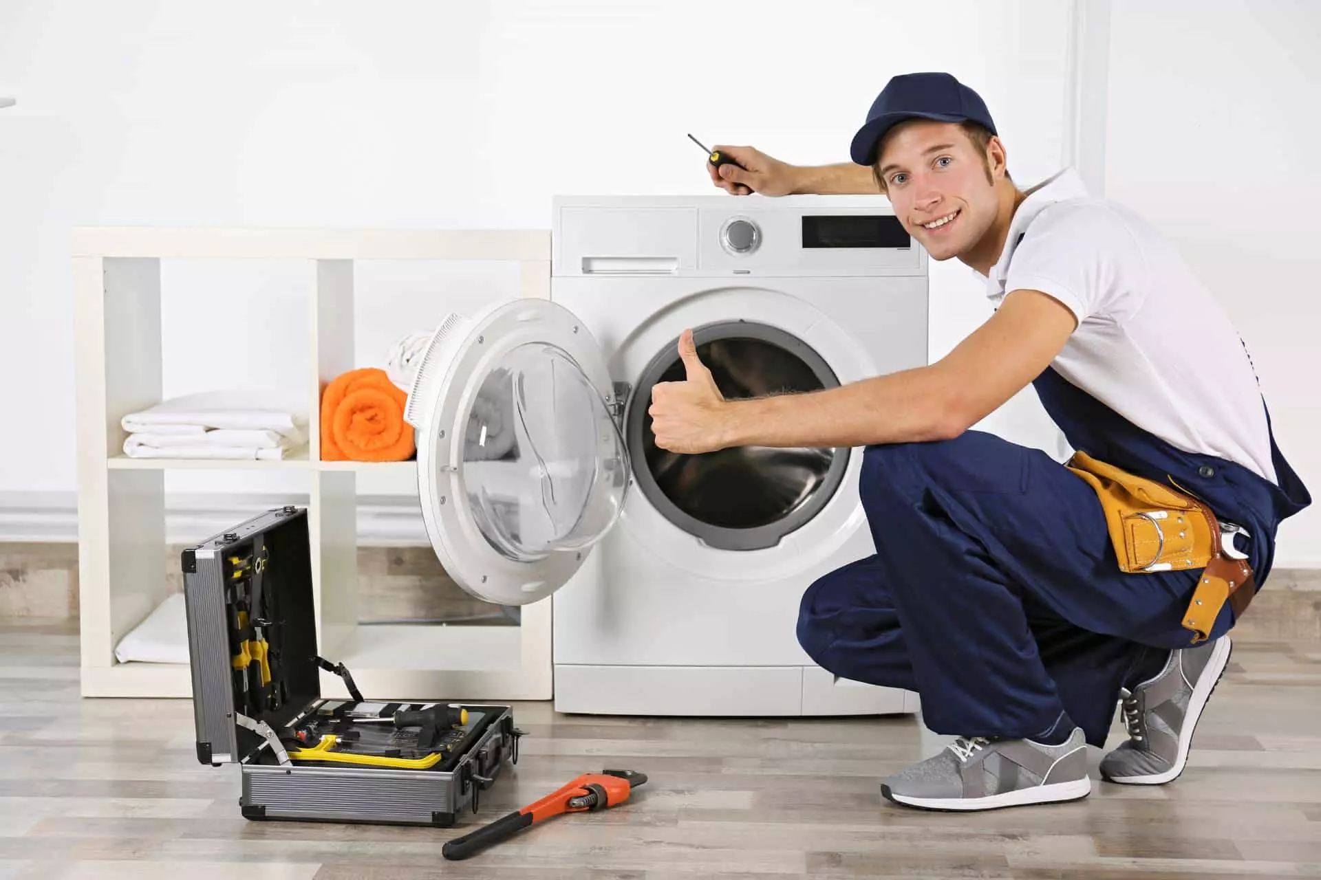 plumber with a washing machine