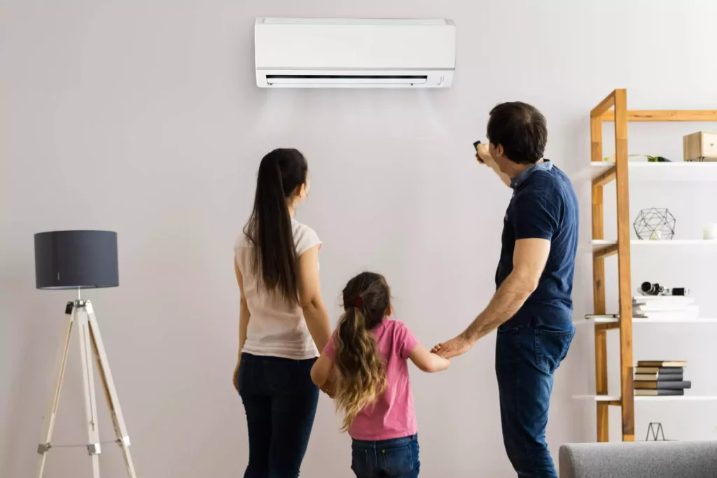 family indoors with AC