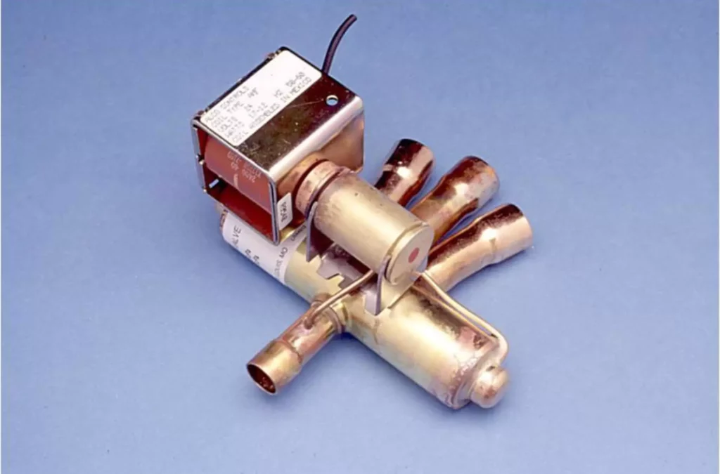 A heat pump reversing valve