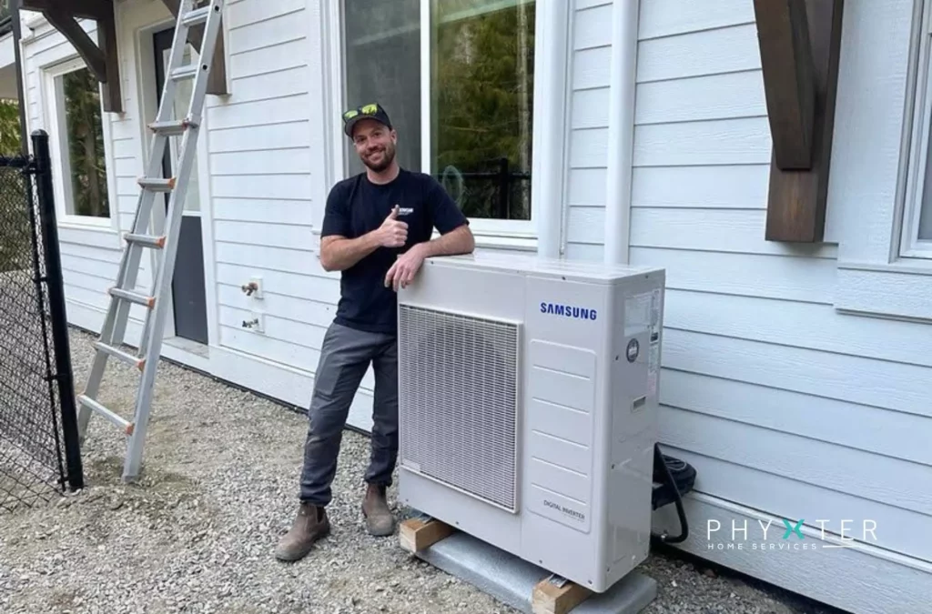 A happy HVAC technician with a heat pump vs air conditioning