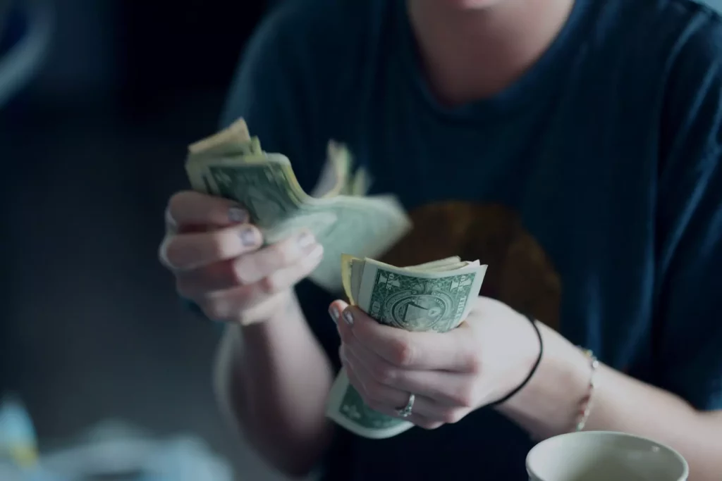 woman counting cash