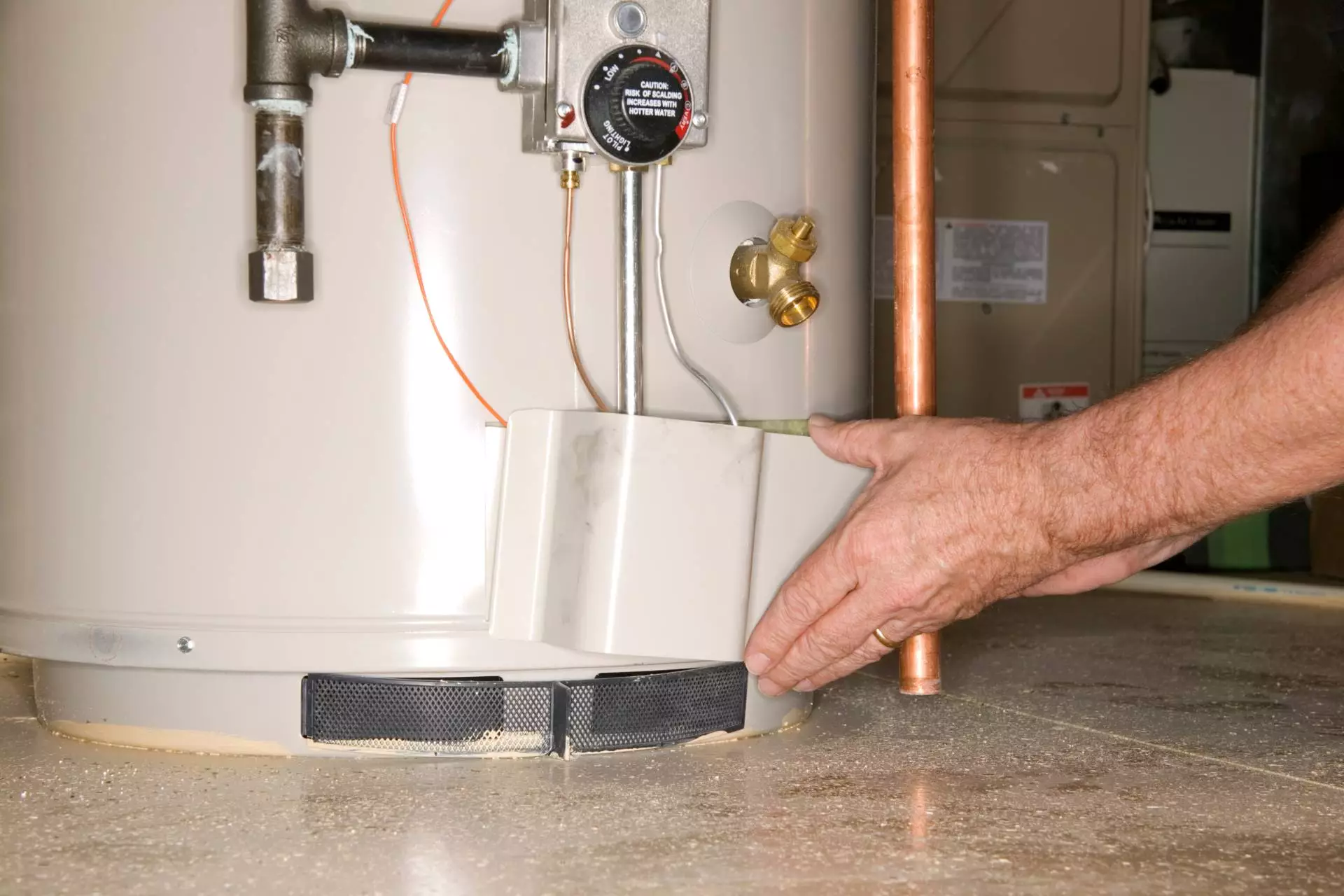 adjusting water heater temperature